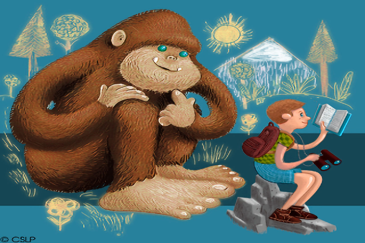 A large ape with a boy wearing a backpack, reading