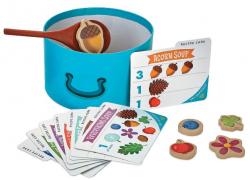 Toddler game, bowl of soup, recipe cards, spoon, and ingredients.